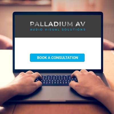 Man booking smart home consultation on Palladium AV website.