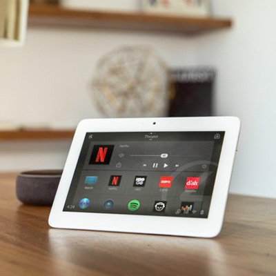 Home automation system by control4, tablet on table that controls all devices in the home.